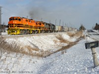 My favourite engine on GEXR in the lead in winter - doesn't it look sharp? Normally a pair of four axles in the lead westbound often indicates a rescue/helper set, but it's not. On the 23'rd GEXR 432 ran to Mac Yard but did not make it out on time, crew taxi'ed back to Stratford. On the 24th GEXR ran 2303/3030 with a train as 432, again, they died at Mac Yard and taxi'ed back to Stratford. What you see is the combination of both sets of motive power and as much tonnage as they could carry on the one-way GEXR 431 on Boxing Day, after the Christmas break. I didn't know what would be leading this day, and was pleasantly surprised.