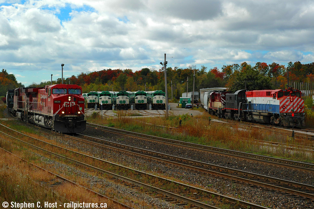7 Trains in a single shot - With OSR pulling ahead switching cars in the Goderich yard and a CP eastbound just around the corner, my timing couldn't have been better. It was a Sunday so all the GO trains were parked in the yard giving me my props. I managed a few 'multiple train' photos from Bert Eliander's house on his hillside but this was one of my best. What makes it for me is the Shortline action - this is the shot I wanted and was the hardest to get.