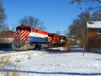 In response to Doug Page's great 1980's varied CN Consist photos.. including <a href=http://www.railpictures.ca/?attachment_id=31929> This one at Copetown</a> which Marcus Stevens said "That’s a lash up I’d kill for today" My response is "Three words: Ontario Southland Railway". Not quite the same, but if you think about it, M420, GP9, RS23.. it's still an almost daily occurance on the OSR and all you have to do is visit Salford or Guelph. <br><br>This is one of the few angles, in the mid to late morning, that actually has a semblance of good light as OSR tends to run backlit for most of their runs to and from Guelph. Check suncalc is all I have to say, and check it good, or hope OSR runs late and you are there for it when the good light is happening. OSR will switch lower yard before continuing north, meaning they go back and forth in this spot giving you lots of opportunity :) <br><br>And on the subject of the new site - railpicures.ca has moved to a new home - and it's very much like moving your house. You moved in to your first or second house a few years ago (or more) and when you move again, you have to take all the accumulated stuff with you and unpack. This is why it took a couple days to get it done , and well, why we're going to have some growing pains. But this house (provider) is bigger, faster, and I hope you like it. We're still hosted in Canada, but our old provider was simply shutting down after being in the business for 8 years, thus why we moved. Once I finish moving all my other sites - I'll work on the search for this one :) 50mm f/1.8, D800