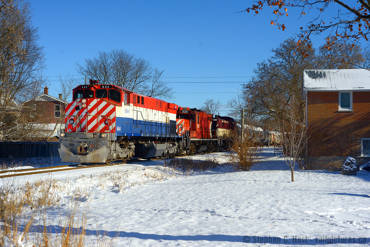 In response to Doug Page's great 1980's varied CN Consist photos.. including  This one at Copetown which Marcus Stevens said "That’s a lash up I’d kill for today" My response is "Three words: Ontario Southland Railway". Not quite the same, but if you think about it, it's happened, and/or happening, and all you have to do is visit Salford or Guelph. 
This is one of the few angles, in the mid to late morning, that actually has a semblence of good light as OSR tends to run backlit for most of their runs to and from Guelph. Check suncalc is all I have to say, and check it good, or hope OSR runs late and you are there for it..