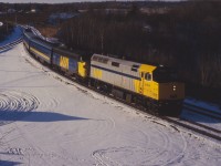 When VIA's F40PH-2s were new and on "shake-down" runs, it was common to see steam-generator equipped locomotives used for heating as well as "protection" power. Judging from the lighting, he train is likely Windsor-Toronto train number 74.