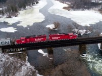 CP's local service departs Smiths Falls towards Brockville on a warm winter day.