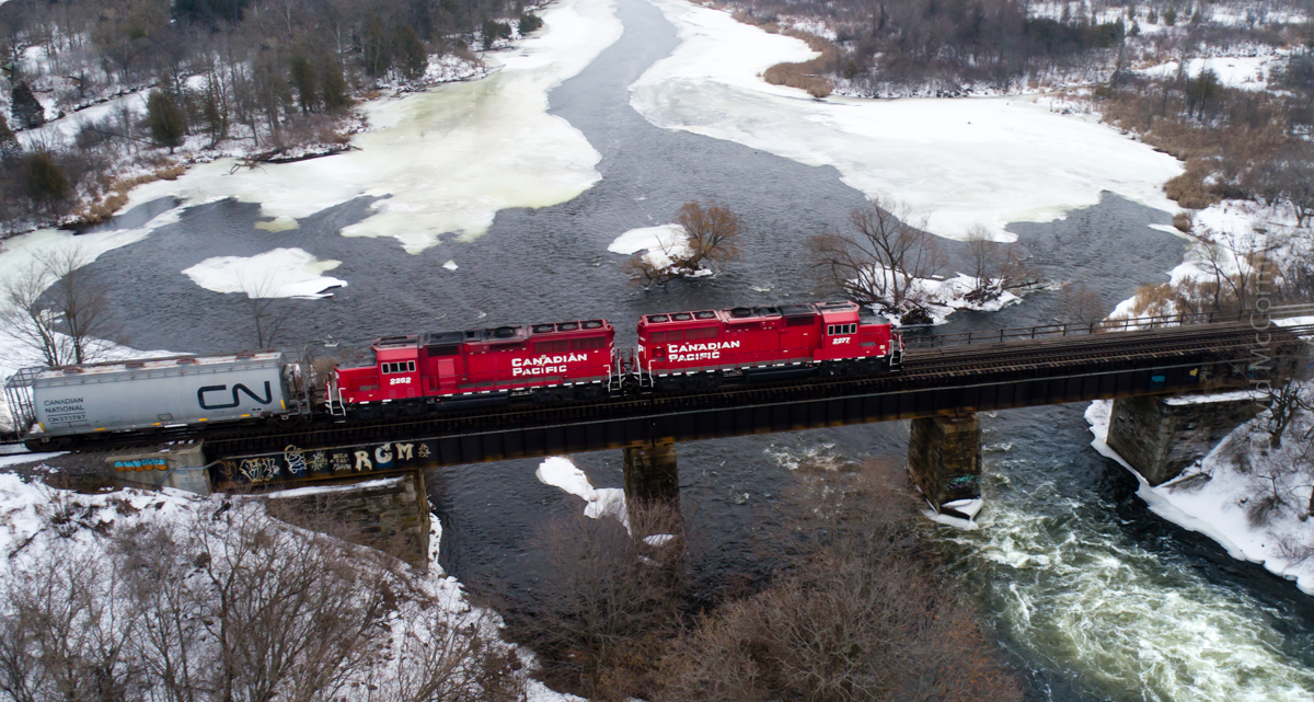 CP's local service departs Smiths Falls towards Brockville on a warm winter day.