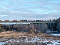 CN 8902 leads the Q120 across the Folly River heading east towards Halifax 