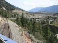 Mile 160.5 on the BC Rail Lillooet sub, a few miles north of Lillooet BC. An impressive structure crossing the mighty Fraser River. On BC Rail, from Kelly Lake to North Vancouver all mile boards were displayed in whole miles and also half miles such as seen in this image, mile 160.5. The half miles came in handy for the track patrols running ahead of trains as well as for MoW slow orders etc. Other points along the way, bridges, permanent slow orders, major culverts etc etc would have a two point decimal mileage associated.