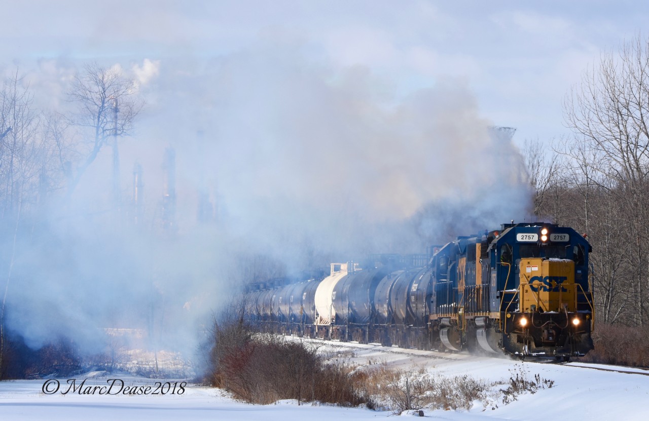It was a slow day in the yard at Sarnia so when I heard the daily CSX train call I thought it was worth a shot trying to catch it at Tashmoo Road. It was already on the move when I got there but did manage to get a few of the smoke show.