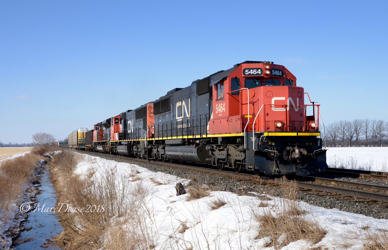 The daily 509 train between London and Sarnia heads back to London with CN 5464 leading followed by CN 5638 and CN 8958.