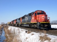 The daily 509 train between London and Sarnia heads back to London with CN 5464 leading followed by CN 5638 and CN 8958.