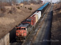 CN 2401 with CN 2020 lead train 501 out of Sarnia through the St. Clair River Tunnel to Port Huron, MI.