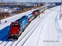 GT 6420 leads a large cut of cars from A yard to C yard in Sarnia.