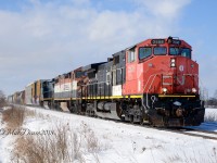 CN 2508 with BCOL 4607 and GECX 9149 east bound out of Sarnia, ON., at Waterworks Sideroad on a beautiful winters morning.