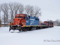 Taking the road less travelled this time of year. It had been a couple of weeks since the last switch at the elevator in Sarnia so the IOX crew decided to run light power down first to ensure all crossings and switches were passable before taking seven grain cars to the elevator.