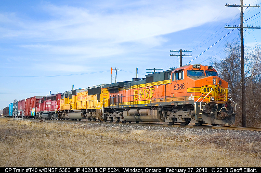 Returning from the U.S. with the transfer, CP Train T40 has a 'hodge-podge' of power with BNSF 5386 on point, UP 4028, and CP 5024 rounding out the trio.  This power has been on the transfer for over a week, but with the horrible weather we've had this has been my first opportunity to shoot it in decent light.