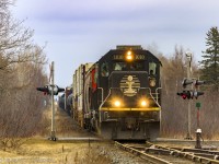 Death Star, IC 1010 leads train A406, as they rumble through the town of Petitcodiac, New Brunswick. An SD60, CN 5480, trails in this killer consist. 