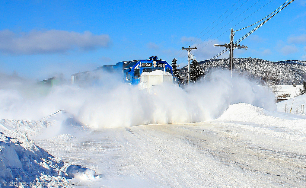 The day after a third snowstorm hit in a one week period, dumping 40+ centimeters of snow, GMTX 2666 leads NBSR eastbound train 908, as they plow through some of the major banks and drifts along the McAdam Sub. In the winter from hell, 2014-2015, my area received records highs of over 600cm of snow. A drastic comparison to this year, 2018, which I don't think we've even gotten 50cm yet...