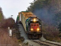 Shot at 600mm with my Sigma 150-600mm lens, NBSR 6340 snakes along the terrain, as they approach Cork, New Brunswick, nearing the hotbox detector at mile 59.