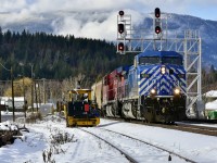 CEFX 1026 takes the south track at Canoe as it leads an eastbound load of empty potash cars.