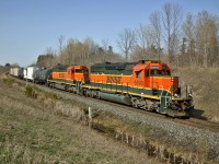 BNSF 6890 and BNSF 6390 work hard to keep 411's train under control as they descend the escarpment.