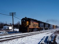 A Baltimore and Ohio GP40-2 leads a pair of Chesapeake and Ohio units through Canfield on a westbound freight in January 1979.