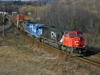 CN 148 has just finished its descent of the Niagara Escarpment with CN 5779, NS 4803 and GCFX 6077