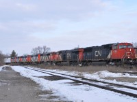 CN 396 makes it's way through Brantford with CN 5785, CN 2282, CN CN 5503, CN 5506, CN 5509, CN 5502, CN 5556, and 118 cars. the 5 CN 5500's are destined for K&K Recycling in Pickering, ON