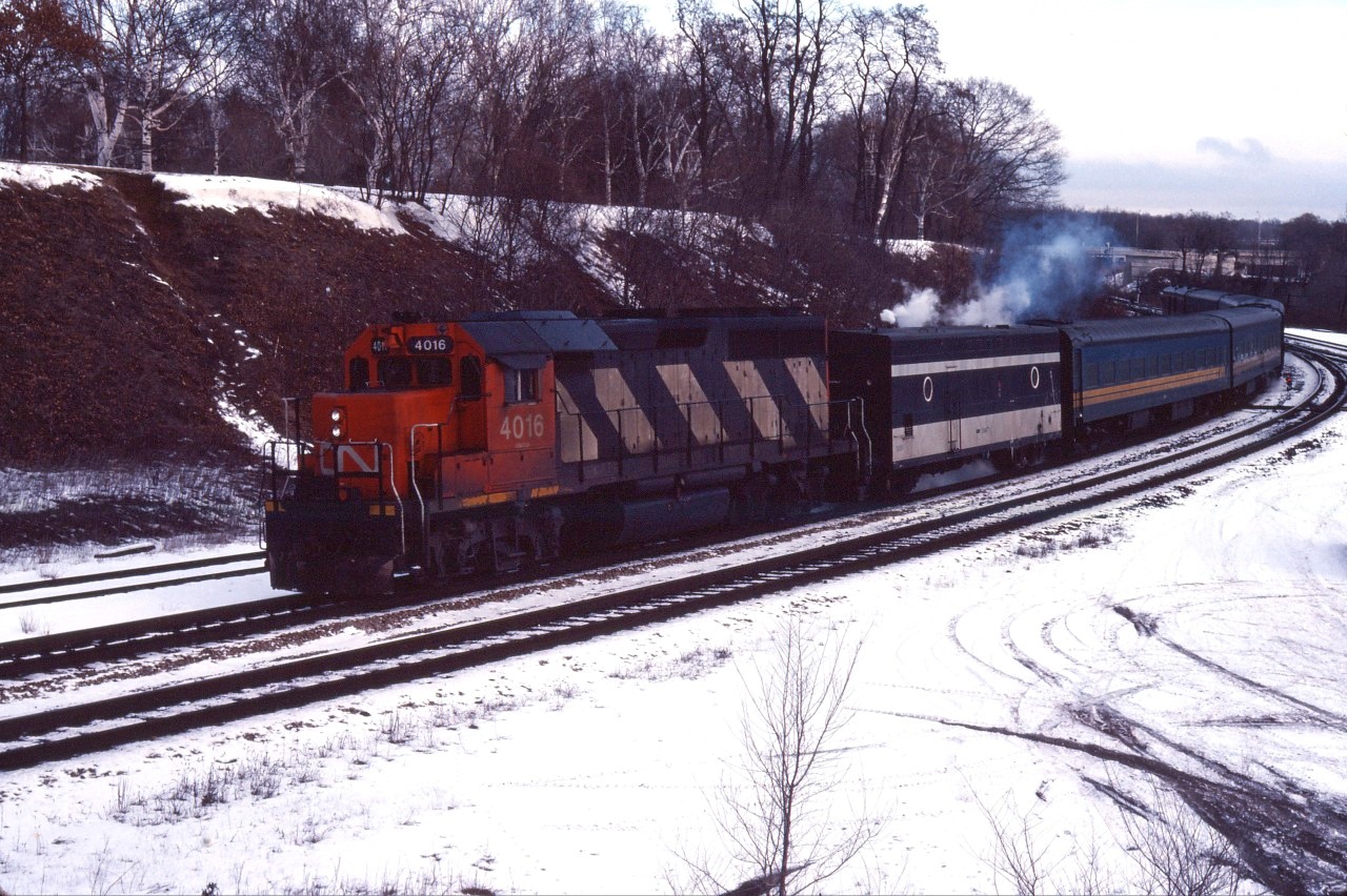 For many years, CN 4016 and 4017 (later 9316 and 9317) were assigned to passenger service out of Toronto. This included runs in southwestern Ontario and on conventional trains to/from Montreal. At times, this also included GO service in the Greater Toronto Area (they received high speed gearing for this service). Here we see GP40 4016 leading a VIA train through Bayview--note the steam generator which still is in CN paint with a small VIA logo next to the number. The baggage car at the tail end also is still in CN paint.