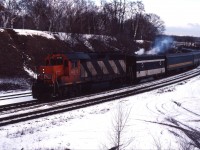 For many years, CN 4016 and 4017 (later 9316 and 9317) were assigned to passenger service out of Toronto. This included runs in southwestern Ontario and on conventional trains to/from Montreal. At times, this also included GO service in the Greater Toronto Area (they received high speed gearing for this service). Here we see GP40 4016 leading a VIA train through Bayview--note the steam generator which still is in CN paint with a small VIA logo next to the number. The baggage car at the tail end also is still in CN paint.