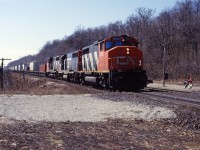 CN started its "Laser" intermodal service to and from Chicago in the mid-1980s. In early days, it often ran with a trio of Grand Trunk Western GP40s/GP40-2s but later operated with CN comfort cabs leading "pooled" GTW locomotives. Over thirty years later, the service continues to run as 148.