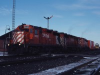 Once again we are at Guelph Jct on a winter's afternoon as a westbound crests the hill powered by GP35s 5022 and 5024 as well as GP30 5000.