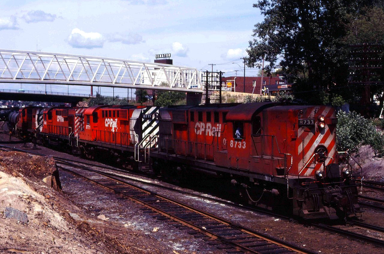 Another shot of an eastbound in Sudbury, this time a solid set of MLWs (RS18s 8733 and 8771, RS10 8560 and RS18 874?).
