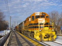 QGRY 3105, QGRY 6908, SLR 805 & SLR 3805 lead SLR 394 which is detouring on CP's Adirondack Sub due to bridge washout as it passses the platforms at Lasalle Station. The leader is a GP40 built as NYC 3072 in 1967.