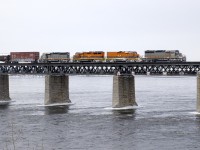 Detour SLR 393 has two QGRY SD40-3's (QGRY 6908 & QGRY 6904) sandwiching two SLR units (SLR 805 & SLR 3805) as it crosses the St. Lawrence River, nearly onto the island of Montreal.
