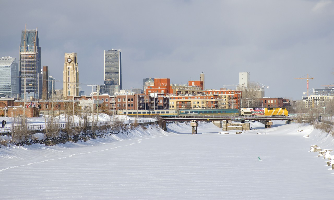 VIA 906 (with its 'Canada 150' markings now gone) leads a slightly late VIA 62 over the frozen Lachine Canal.