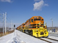 Opened by the AMT (now the RTM) in January 2017 in Lachine on the Candiac line, the Du Canal Station is the newest station on the RTM's network of commuter lines. Here detour train SLR 394 (with SLR 3004, SLR 3804, SLR 804, SLR 805 & SLR 3805 for power) is passing the station. Barely visible in the distance at right is Mount Royal.