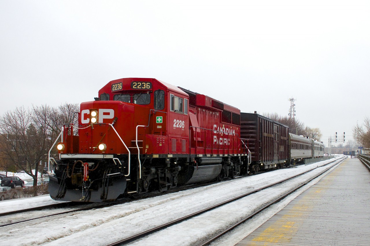 CP's TEC train is passing through Lasalle Station with CP 2236 leading, en route for Rouses Point, NY.