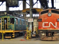 <br>
<br>
33 years separates unlikely neighbours at the Elgin County Railway Museum,
<br>
<br>
 ex L&PS Motor L1 (GE March 1915) 
<br>
<br>
and ex CN 9171 (ex GTW 9013 F3Au, EMD May 1948); 
<br>
<br>
L1 in process of some needed TLC. 
<br>
<br>
August 31, 2012 digital by S.Danko


