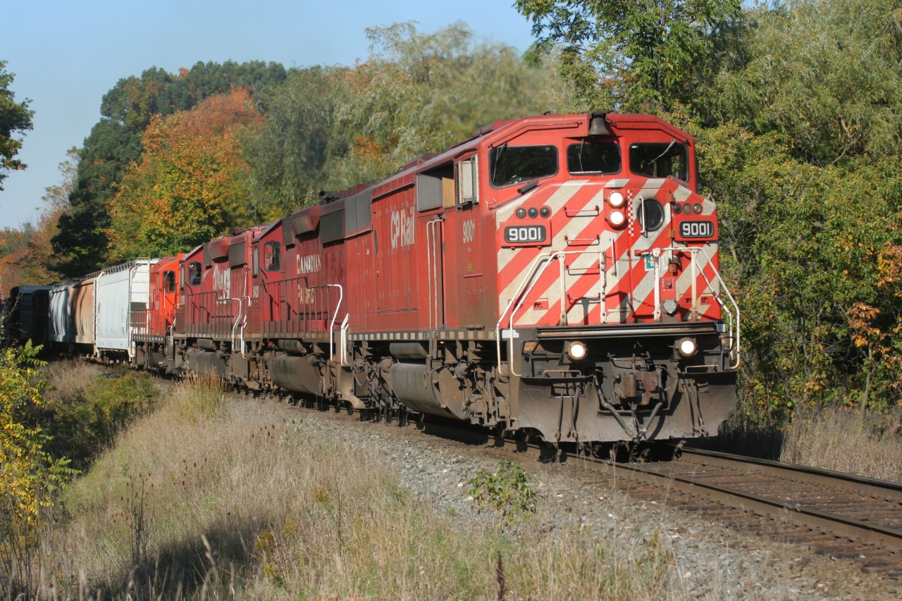 The last Canadian Pacific “red barn” I ever photographed leads a westbound freight approaching the Orrs Lake mileboard west of Galt, Ontario on a stunning fall day. CP 9001 was in the final SD40-2F group to be retired from the active roster during 2016.