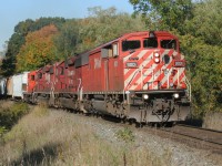 The last Canadian Pacific “red barn” I ever photographed leads a westbound freight approaching the Orrs Lake mileboard west of Galt, Ontario on a stunning fall day. CP 9001 was in the final SD40-2F group to be retired from the active roster during 2016. 