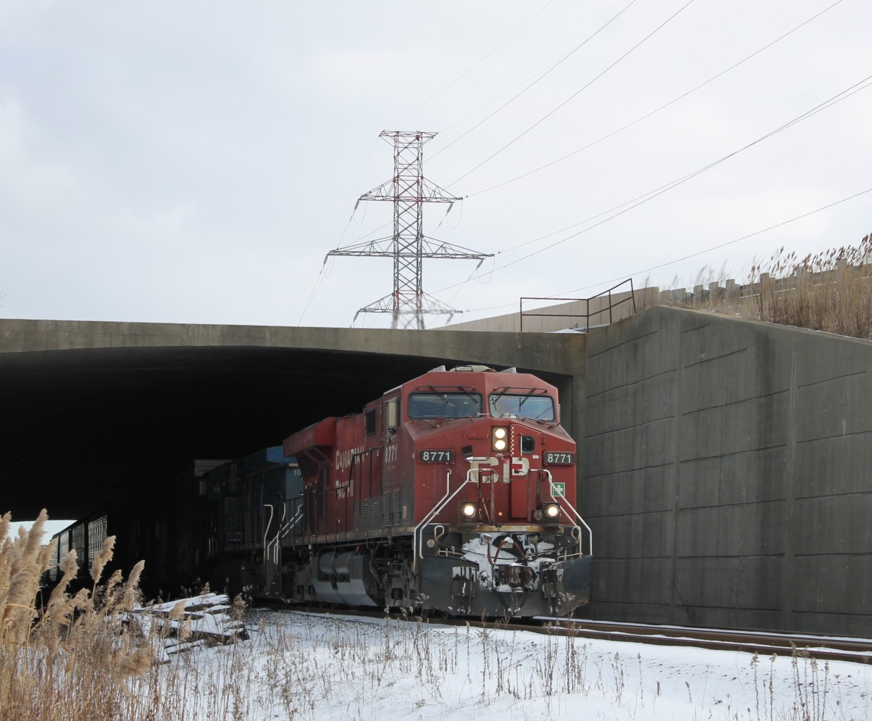 CP 235 comes out from underneath the E.C. Row Expressway overpass and slowly approaches the CP Walkerville yard behind me.