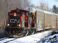 In 2011 CN had yet to transfer its switching operations at the CAMI Auto plant in Ingersol to the Ontario Southland. I only managed to catch CN working here a few times and this day catching a GMD-1 I wasn't familiar with in Ontario was a nice treat. The train has left CN rails and is seen traveling over the former CP St. Thomas subdivision for a few miles to the CAMI plant. I sure do miss seeing GMD-1's in operation in Ontario. 
