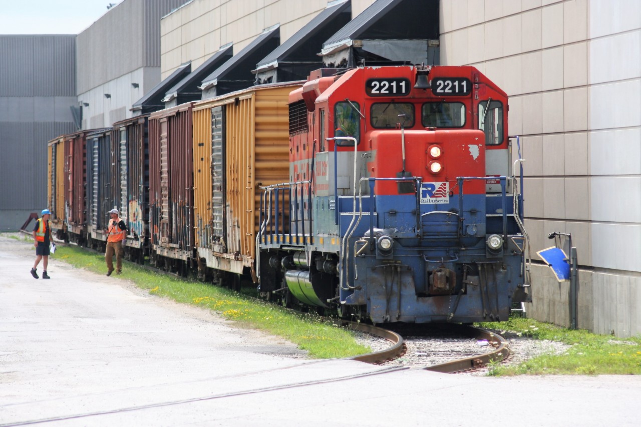 Goderich-Exeter Railway train 580 with RLK GP35m 2211 (at that time still lettered for RailAmerica) spots boxcars at the Smurfit-MBI facility in Guelph, Ontario.