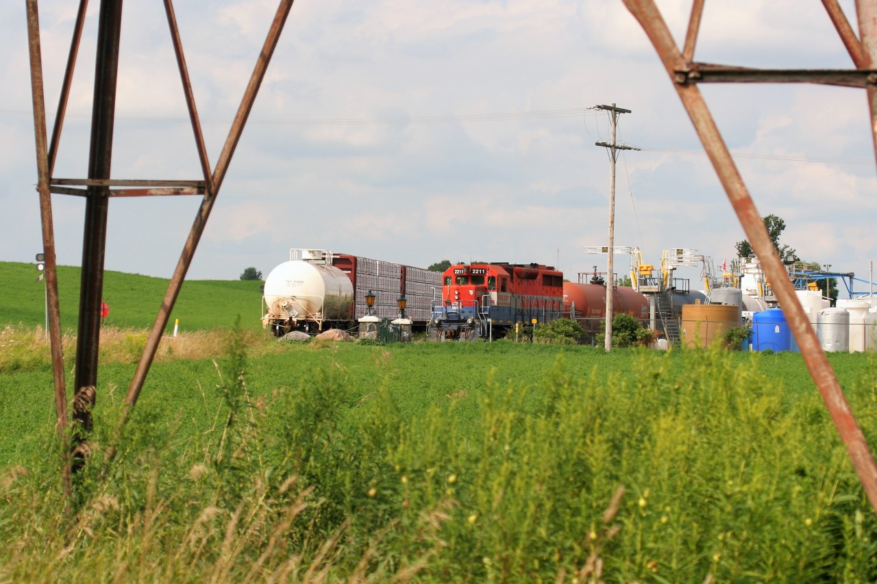 Goderich-Exeter Railway train 580 with RLK GP35m 2211 (at that time still lettered for RailAmerica) is viewed switching the Flochem facility, located a few miles outside of Guelph, Ontario on the former CN Fergus Spur.