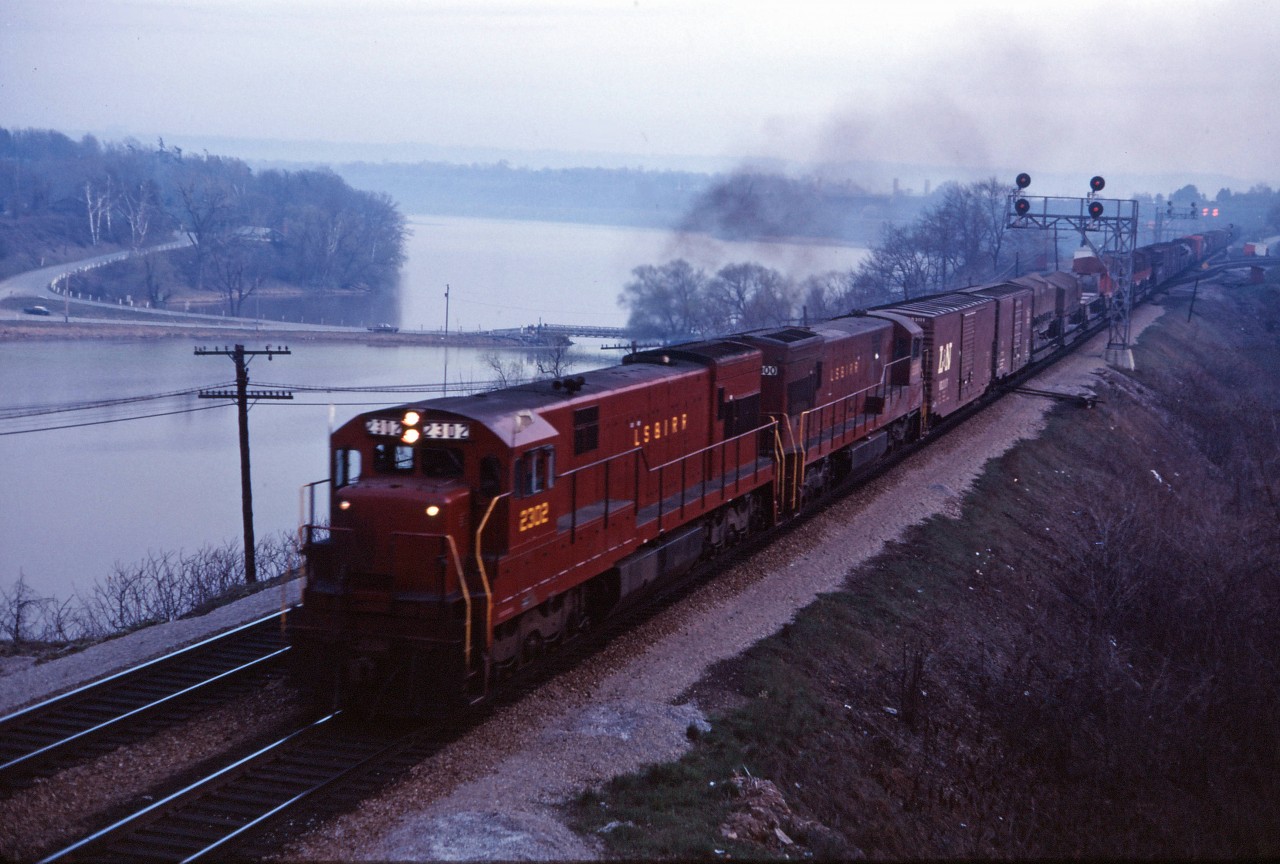 Well, this edition of the "Starlight" certainly was a surprise--powered by a pair of Lake Superior & Ishpeming U23Cs. Over the winter of 1969-1970, according to the UCRS Newsletter, CP leased three of these units (2300-2302) and based them out of Winnipeg...so catching them in southern Ontario was definitely unusual!