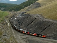 Coal empties 770 approaches the Cardinal River mine loadout at the end of a spur from Leyland Junction near Cadomin Alberta. The mine is located at the highest operated point on CN
