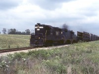 "Running extra" and flying the white flags required by the UCOR, N&W GP9 2708 and GP7 3453 lead a westbound at Cayuga on a July afternoon in 1979.