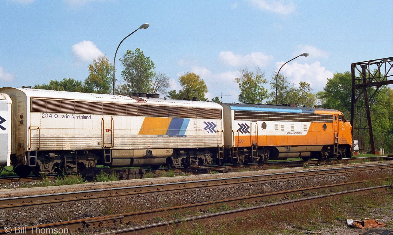 Another view of the Ontario Northland "Northlander" in Washago in 2001, with rebuilt FP7 2001 leading generator car 204. 204 (ex-Milwaukee Road F7B 89B) was one of 3 secondhand MILW B-units rebuild by ONR into Head End Power generator cars for use to provide heating and lighting power on its passenger cars. ONR also rebuilt similar "APU" generator cars for GO Transit out of former BN B-units, one of which they later acquired (ONT 205, ex-GO 801).