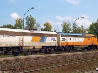 Another view of the Ontario Northland "Northlander" in Washago in 2001, with rebuilt FP7 2001 leading generator car 204. 204 (ex-Milwaukee Road F7B 89B) was one of 3 secondhand MILW B-units rebuild by ONR into Head End Power generator cars for use to provide heating and lighting power on its passenger cars. ONR also rebuilt similar "APU" generator cars for GO Transit out of former BN B-units, one of which they later acquired (ONT 205, ex-GO 801).