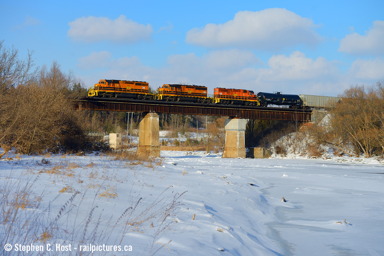The Breslau bridge over the Grand River has been a popular (Glenn Courtney) |  spot (arnold mooney)  for photographers going back decades. It has also been a point of contention with a 10 (or so) MPH slow order going back about a decade or two. GEXR/Metrolinx started fixing the bridge up last year, and after adding some handrails to the east side, the handrails are all gone and the slow order is no more - to my and crews delight
Also, when was the last time GEXR 432/1 was all orange? I can still count on one hand how many times this has happened since G&W paint arrived. Back when winter was a thing, I made sure to get out there and get what I think is the best juxtaposition of G&W's scheme: Blue skies, white snow, and orange locomotives.

Here's a photo of mine from 2015 of GEXR  all yellow  with one of our favourite hoggers at the throttle.