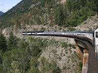 A warm summer afternoon, having just descended the Kelly Lake Hill, we are looking forward to a brief stop at Lillooet, pickup some operating authority, stretch my legs and the all important "comfort stop" in a gender designated room in the station. This day for me started at 0:600 in Quesnel, this image taken at 15:08 and we still have another 90 miles and perhaps 5 hours on duty yet to go. It's a long day on the Rocky Mountaineer "Fraser Discovery" operating on three subdivisions. You will notice a person in the cab of the second unit, one of the on board staff having a free moment from the coaches to enjoy the scenery and most likely sneak a quick smoke.