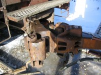 "Give'er a stretch"  and that other famous line "it was like that when we got here". A prime example of what happens on a industrial lumber loading track when a front end loader is used to switch rail cars. The cars needed to be repaired after this "by-pass" of drawbars, product was delayed and the mill was billed for the damages.